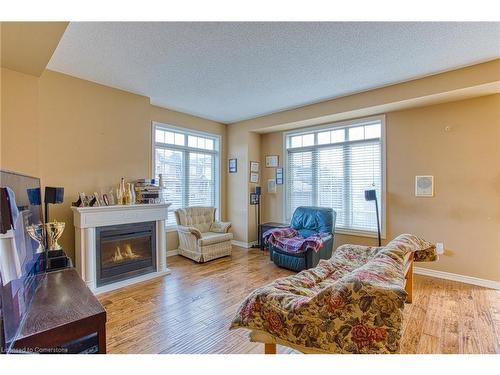 3 Springstead Avenue, Stoney Creek, ON - Indoor Photo Showing Living Room With Fireplace