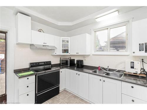 47 Clyde Street, Hamilton, ON - Indoor Photo Showing Kitchen With Double Sink