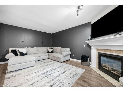 22 Southbrook Drive, Binbrook, ON - Indoor Photo Showing Living Room With Fireplace