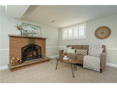 7984 Michael Street, Niagara Falls, ON - Indoor Photo Showing Living Room With Fireplace