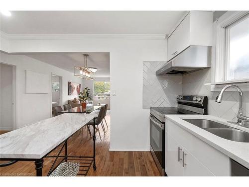 642 West 5Th Street, Hamilton, ON - Indoor Photo Showing Kitchen With Double Sink