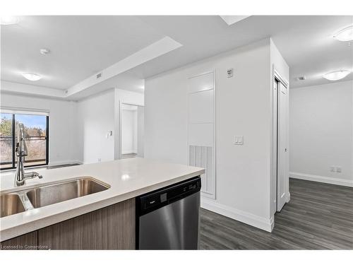 503-30 Hamilton Street S, Waterdown, ON - Indoor Photo Showing Kitchen With Double Sink