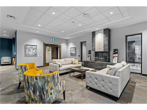 503-30 Hamilton Street S, Waterdown, ON - Indoor Photo Showing Living Room With Fireplace