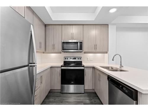 503-30 Hamilton Street S, Waterdown, ON - Indoor Photo Showing Kitchen With Double Sink