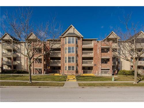 404-4015 Kilmer Drive, Burlington, ON - Outdoor With Balcony With Facade