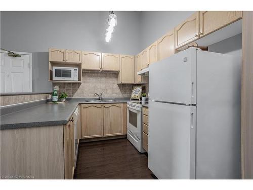 404-4015 Kilmer Drive, Burlington, ON - Indoor Photo Showing Kitchen With Double Sink