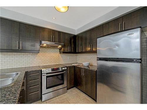 1395 Costigan Road, Milton, ON - Indoor Photo Showing Kitchen With Stainless Steel Kitchen With Double Sink