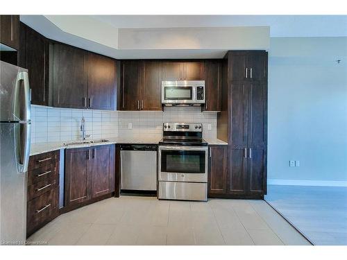 605-560 North Service Road, Grimsby, ON - Indoor Photo Showing Kitchen With Stainless Steel Kitchen