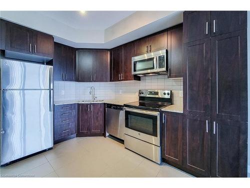 605-560 North Service Road, Grimsby, ON - Indoor Photo Showing Kitchen With Stainless Steel Kitchen