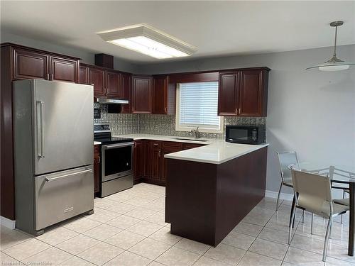 Upper-8047 Harvest Crescent, Niagara Falls, ON - Indoor Photo Showing Kitchen With Stainless Steel Kitchen