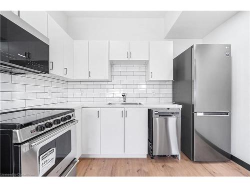 32 Britannia Avenue, Hamilton, ON - Indoor Photo Showing Kitchen With Stainless Steel Kitchen With Upgraded Kitchen