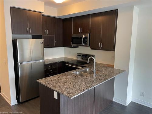 103-128 Grovewood Common, Oakville, ON - Indoor Photo Showing Kitchen With Double Sink