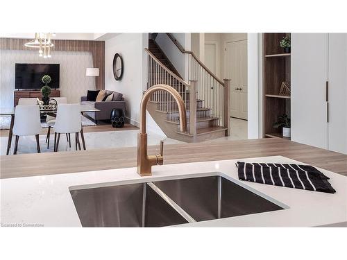 57 Eleanor Avenue, Hamilton, ON - Indoor Photo Showing Kitchen With Double Sink