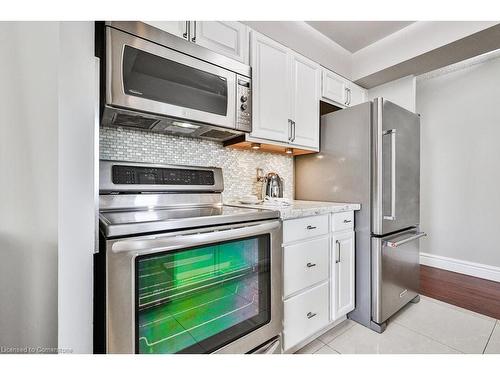 708-1 Hickory Tree Road, Toronto, ON - Indoor Photo Showing Kitchen With Stainless Steel Kitchen