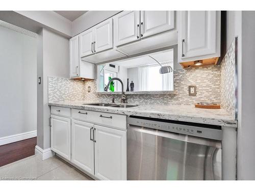 708-1 Hickory Tree Road, Toronto, ON - Indoor Photo Showing Kitchen With Double Sink With Upgraded Kitchen