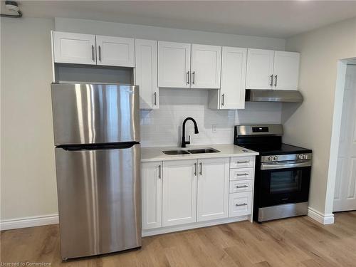 15-1759 King Street E, Hamilton, ON - Indoor Photo Showing Kitchen With Stainless Steel Kitchen With Double Sink