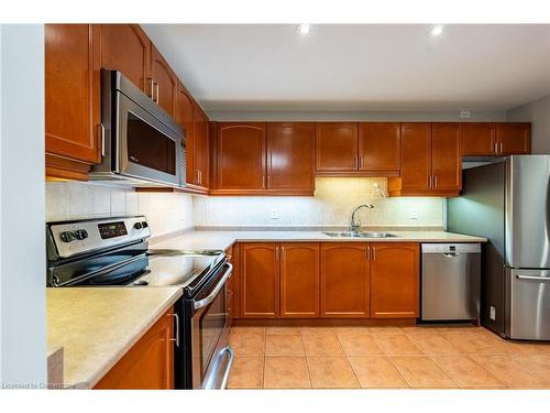 207-4000 Creekside Drive, Dundas, ON - Indoor Photo Showing Kitchen With Double Sink