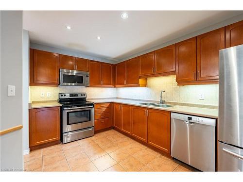 207-4000 Creekside Drive, Dundas, ON - Indoor Photo Showing Kitchen With Double Sink