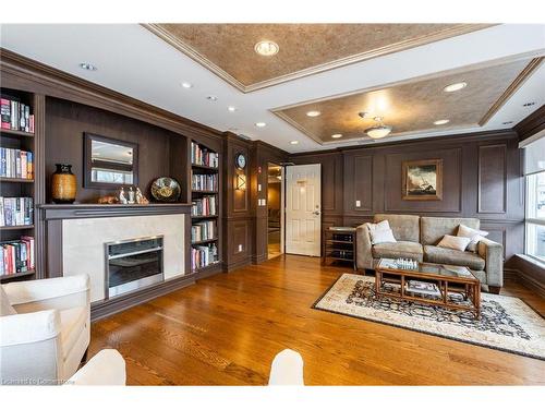 207-4000 Creekside Drive, Dundas, ON - Indoor Photo Showing Living Room With Fireplace