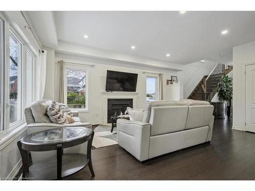 235 Stone Church Road E, Hamilton, ON - Indoor Photo Showing Living Room With Fireplace