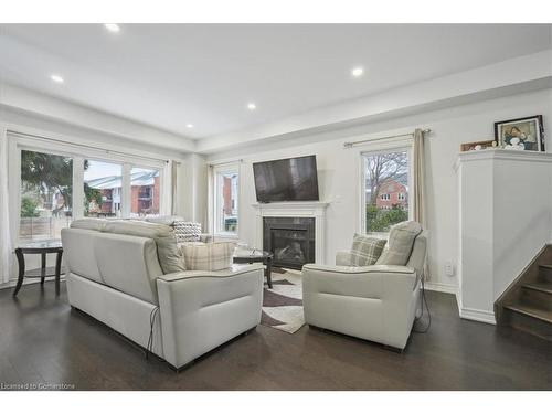 235 Stone Church Road E, Hamilton, ON - Indoor Photo Showing Living Room With Fireplace