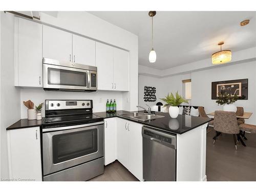 302-58 Macaulay Avenue, Toronto, ON - Indoor Photo Showing Kitchen With Double Sink