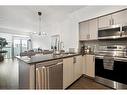 222-65 Speers Road, Oakville, ON  - Indoor Photo Showing Kitchen With Stainless Steel Kitchen 