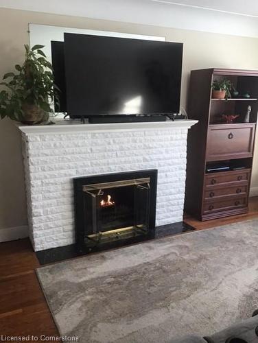 14 Danbury Street, Dundas, ON - Indoor Photo Showing Living Room With Fireplace