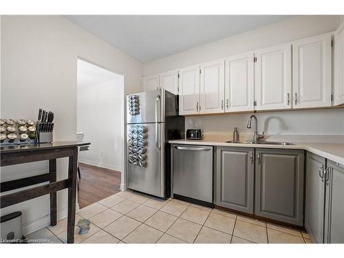 1414-500 Green Road, Stoney Creek, ON - Indoor Photo Showing Kitchen With Double Sink