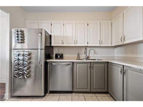 1414-500 Green Road, Stoney Creek, ON - Indoor Photo Showing Kitchen With Double Sink