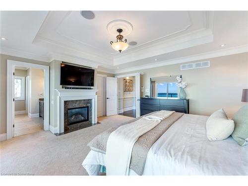 56 Aquamarine Drive, Hamilton, ON - Indoor Photo Showing Bedroom With Fireplace