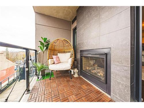 402-181 James Street N, Hamilton, ON - Indoor Photo Showing Living Room With Fireplace