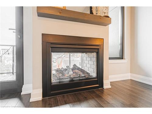 402-181 James Street N, Hamilton, ON - Indoor With Fireplace