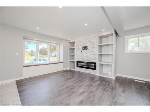 5 Lewis Street, Hamilton, ON - Indoor Photo Showing Living Room With Fireplace