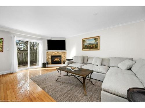 133-3333 New Street, Burlington, ON - Indoor Photo Showing Living Room With Fireplace