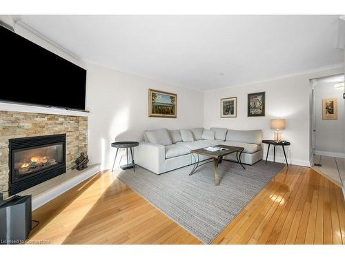 133-3333 New Street, Burlington, ON - Indoor Photo Showing Living Room With Fireplace