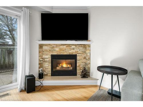 133-3333 New Street, Burlington, ON - Indoor Photo Showing Living Room With Fireplace