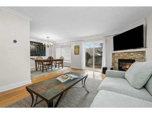 133-3333 New Street, Burlington, ON - Indoor Photo Showing Living Room With Fireplace