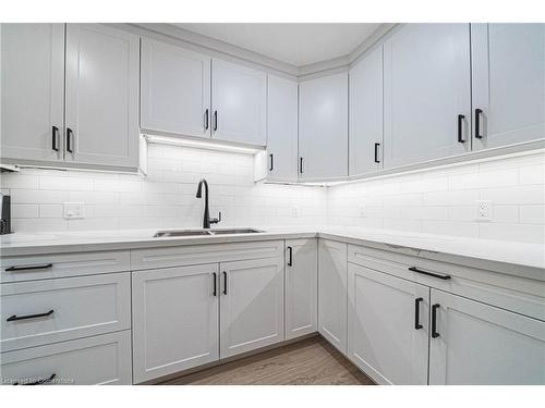 4-445 Woodview Road, Burlington, ON - Indoor Photo Showing Kitchen With Double Sink