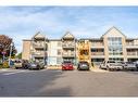 109-2010 Cleaver Avenue, Burlington, ON  - Outdoor With Balcony With Facade 