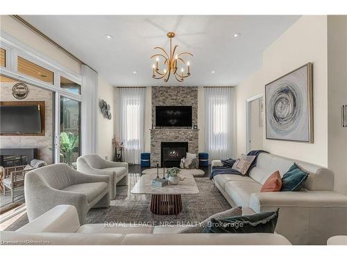 14 Tuscany Court, St. Catharines, ON - Indoor Photo Showing Living Room With Fireplace