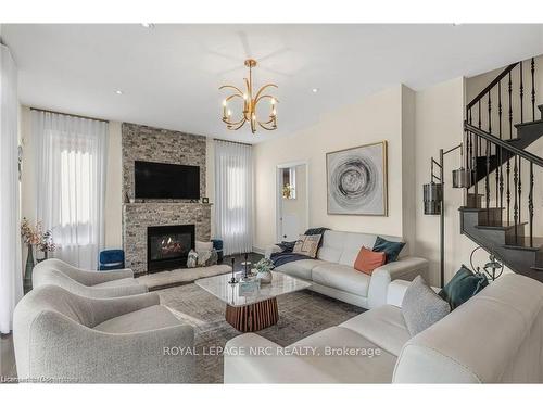 14 Tuscany Court, St. Catharines, ON - Indoor Photo Showing Living Room With Fireplace