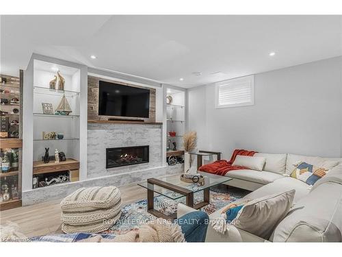 14 Tuscany Court, St. Catharines, ON - Indoor Photo Showing Living Room With Fireplace