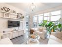 102-10 Concord Place, Grimsby, ON  - Indoor Photo Showing Living Room 