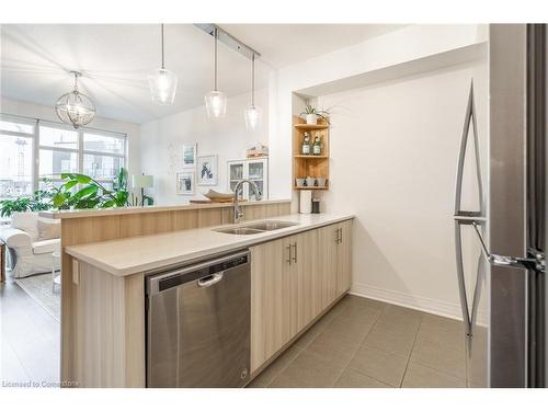 102-10 Concord Place, Grimsby, ON - Indoor Photo Showing Kitchen With Double Sink