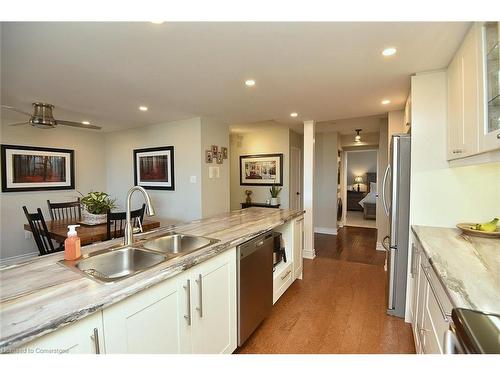 1502-2055 Upper Middle Road, Burlington, ON - Indoor Photo Showing Kitchen With Double Sink