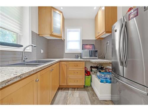 1617 Main Street E, Hamilton, ON - Indoor Photo Showing Kitchen With Double Sink