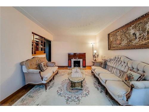 923 Upper Ottawa Street, Hamilton, ON - Indoor Photo Showing Living Room With Fireplace