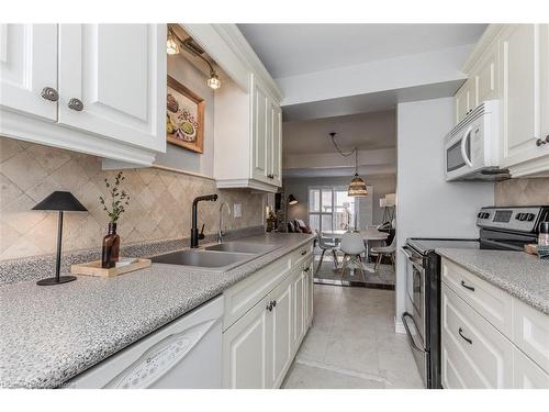 14 Montclair Crescent, Simcoe, ON - Indoor Photo Showing Kitchen With Double Sink