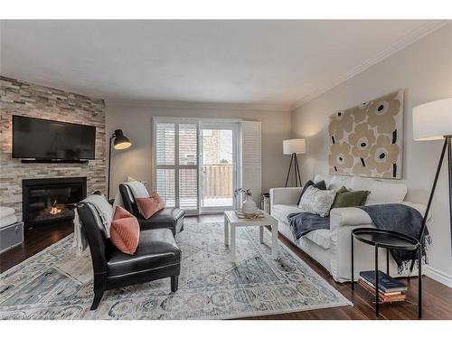 14 Montclair Crescent, Simcoe, ON - Indoor Photo Showing Living Room With Fireplace